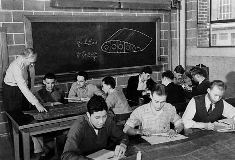 Professor Bruhn and students (note slide rules).