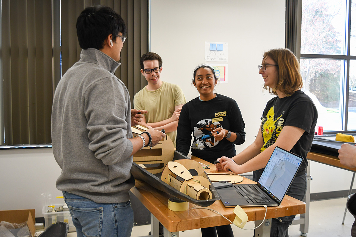 Students working on a drone chassis