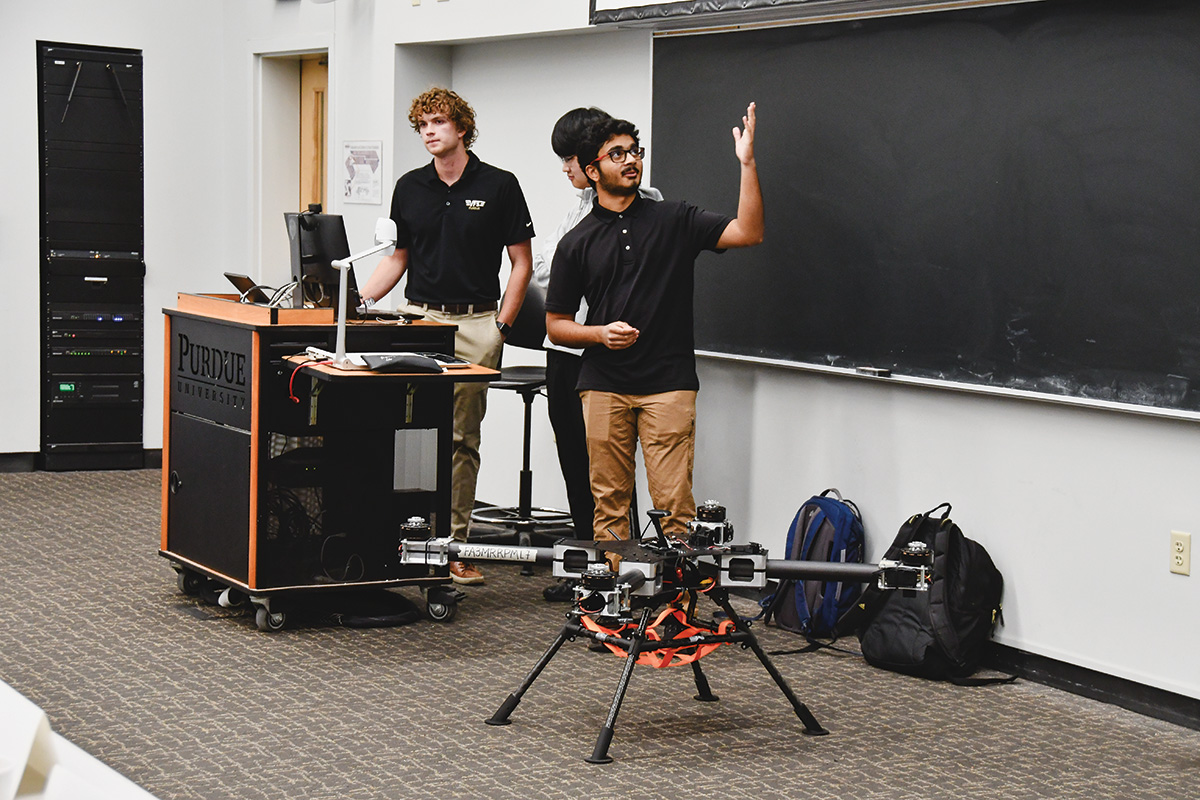 Purdue students give a presentation on their 40-percent-scale drone, built using prize funding from the GoAero competition