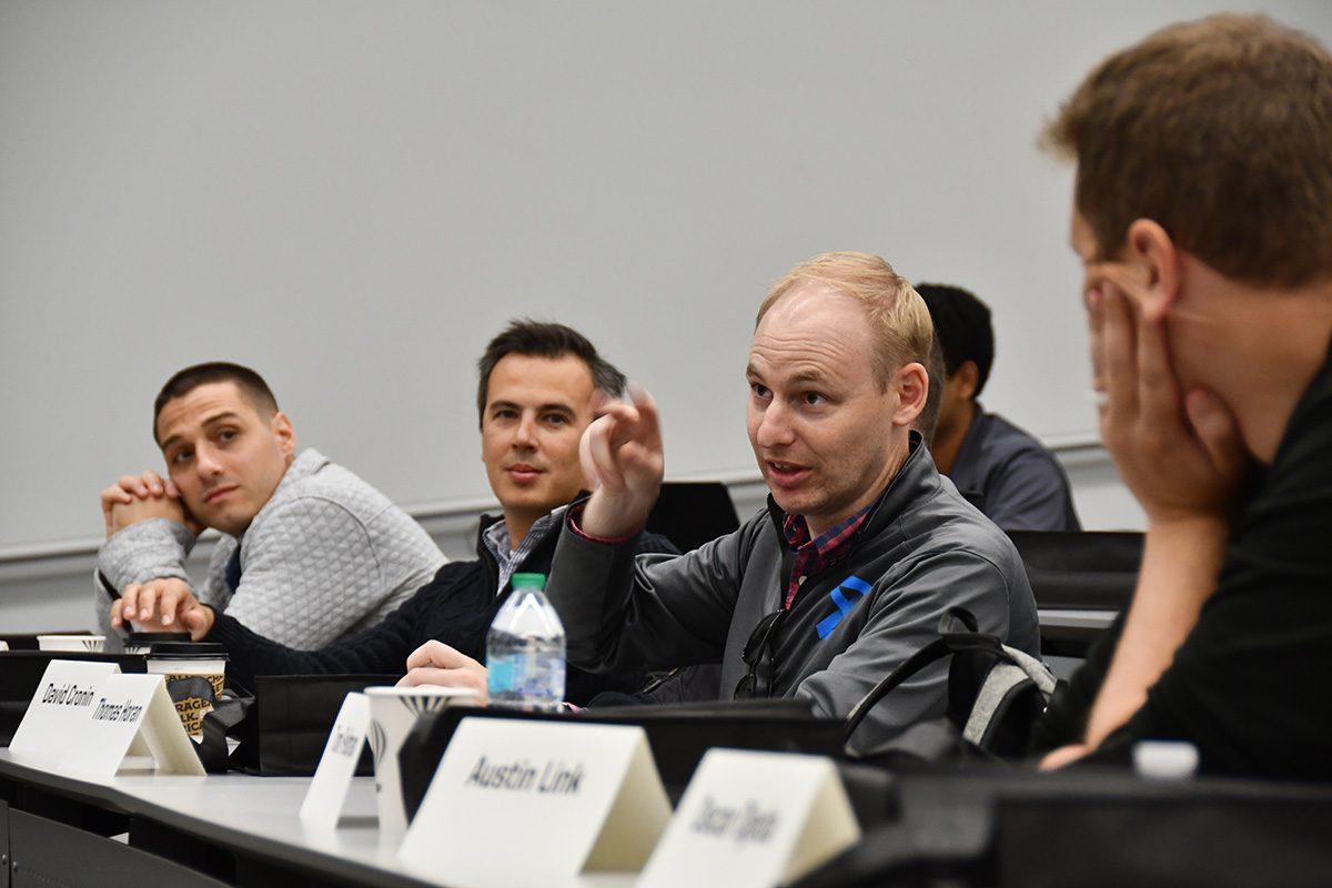 Thomas Horan, a Purdue Engineering 38 by 38 Award honoree, gives feedback during a presentation by the GoAero Purdue team.