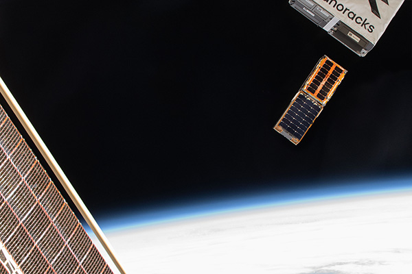 SNOOPI satellite deploying to low earth orbit from the International Space Station