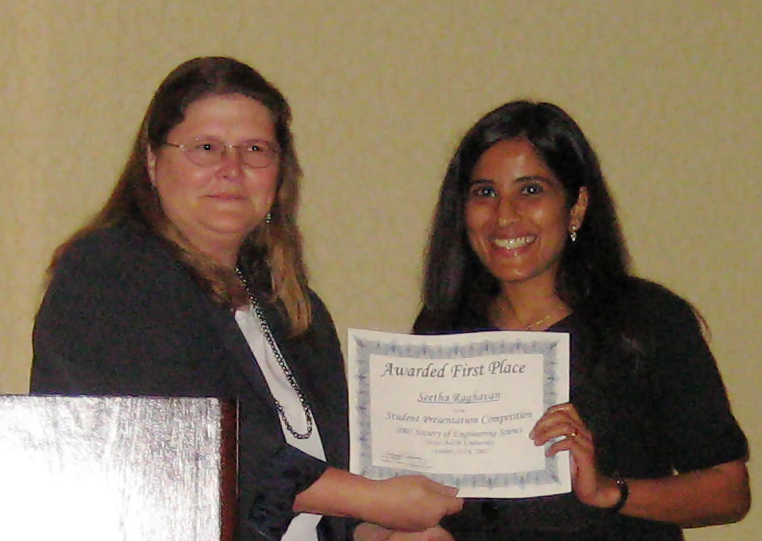 Seetha Raghavan receiving the award from Dr Helen Reed, Professor and Head of Dept of Aerospace Engineering at Texas A&M university where the conference was held