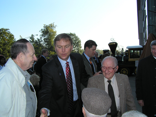 Professor Farris greeting Faculty Emeriti and friends at the unveiling of the Neil Armstrong Statue in October of 2007