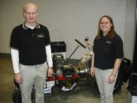 Randy Eckel and Ashley Johnson with the 1/4-Scale Tractor