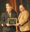 Professor Bill Field receiving his award