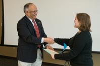Emily Gullotti receives the Chorafas Award from Associate Dean Jay Gore