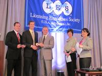 Schryver and Connell receiving their award