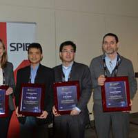 Ji-Xin Cheng (center) receiving the SPIE Translational Research Best Paper Award.