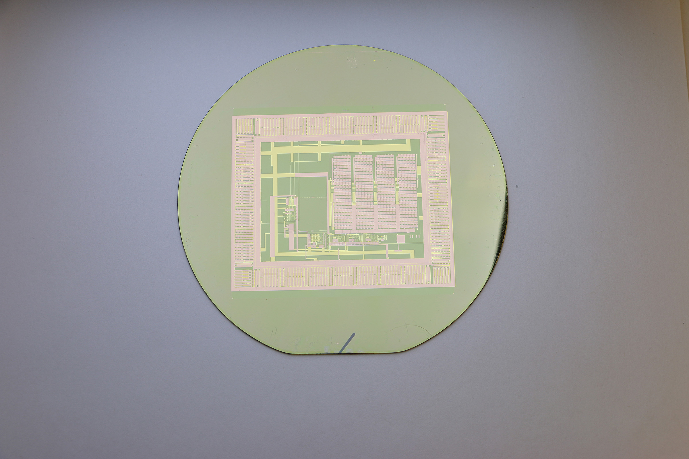 A thin-film electronic circuit can peel easily from its silicon wafer with water, making the wafer reusable for building a nearly infinite number of circuits. (Purdue University image/Chi Hwan Lee)