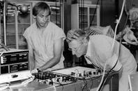 A graduate student and Leslie A. Geddes in the lab