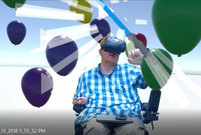 Man in wheelchair experiencing VR