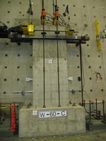 Seismic Response of Reinforced Concrete Walls with Lap Splices