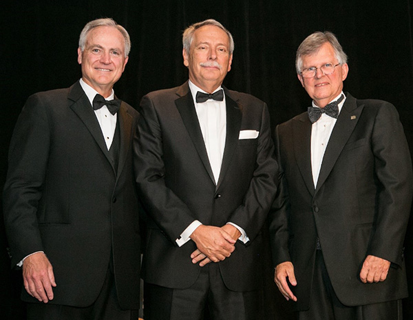 Tom Sorley (left), 2019 president of the National Academy of Construction, Harold Force, and Hugh Rice, 2018 NAC president, are shown here during the formal induction of the academy's class of 2018 in San Diego, CA.