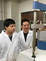 SURF student Xuanchi Li (left) gets assistance from his graduate student mentor, Fei Tao. (Photo: Alain El Howayek)