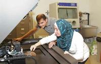 Student Nadia Aljabi with her PhD graduate student mentor, David Restrepo Arango, at the 3D printer. (Photo: Pablo Zavattieri)