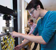 Gordon Jarrold tests chiral PXCM designs as lab manager David Restrepo looks on.