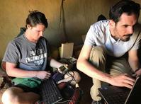 Brandon Boor, assistant professor of civil engineering, right, and student Michael Tishchenko monitor the air quality in a Nandi kitchen. Boor and his EPICS class have been researching methods to reduce the indoor air pollution generated by built-in stoves.