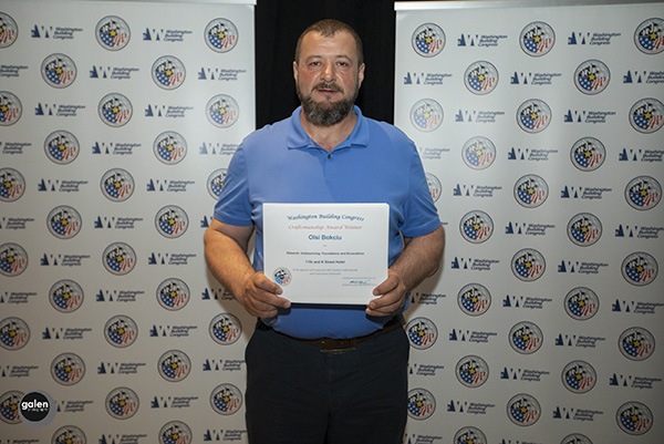 Foreman Olsi Bokciu led the five-person team of Steele Foundation LLC underpinning and shoring craftsmen on the Moxy Hotel project at 11th and K Streets N.W. in downtown Washington, D.C. He proudly displays the 2019 Washington Building Congress Craftmanship Award in the site work category. Bokciu, who joined the company in 2005, has been a foreman since 2008.