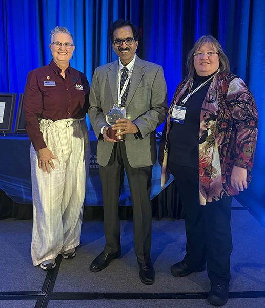 Dr. Rao "GS" Govindaraju accepting the EWRI Lifetime Achievement Award