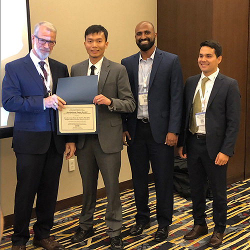 (From left) Richard Denney (FHWA) presenting co-authors Howell Li, Jijo Mathew and Daniel Saldivar-Carranza with the Exceptional Paper award