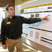 Brian Rogers presents his research data at the 2016 SURF Research Symposium.