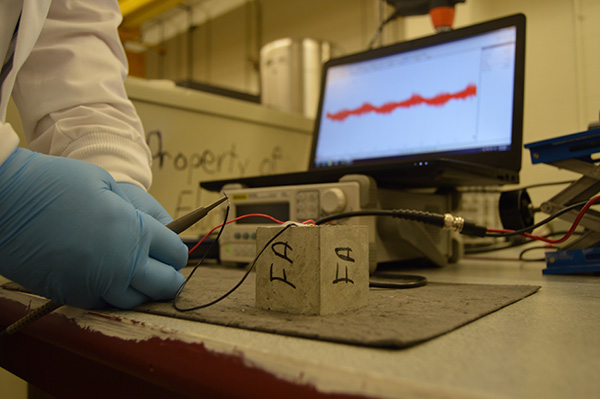 Associate Professor Luna Lu's team uses piezoelectric sensors coupled with electromechanical impedance to determine early-age properties of concrete.