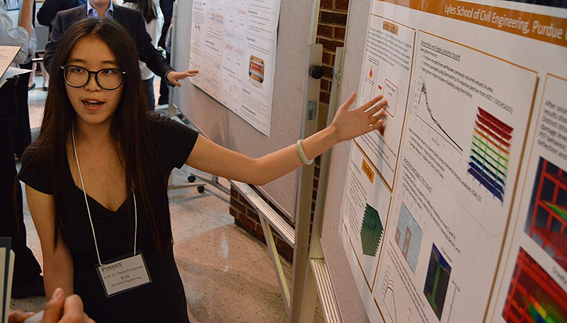 CE undergrad Yi Li conducted research on post-earthquake fire assessment of steel buildings. SURF participants deliver poster presentations on the work they have done.