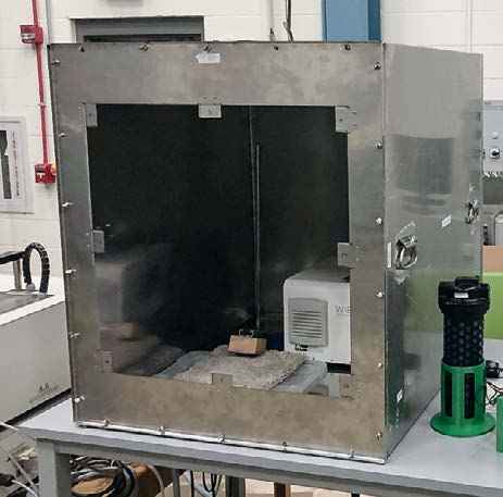 Brian Magnuson, an undergraduate student researcher, helped design and build a full-scale environmental chamber to conduct dust transfer experiments.