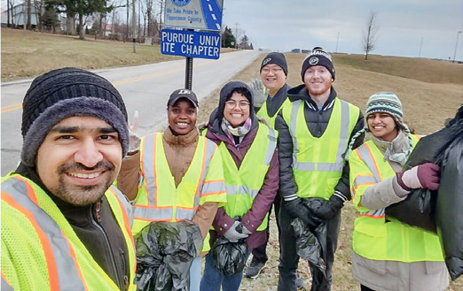 Students clean up trash along a two-mile section of a country road the ITE chapter maintains as part of Tippecanoe Countys Adopt-a-Road program.