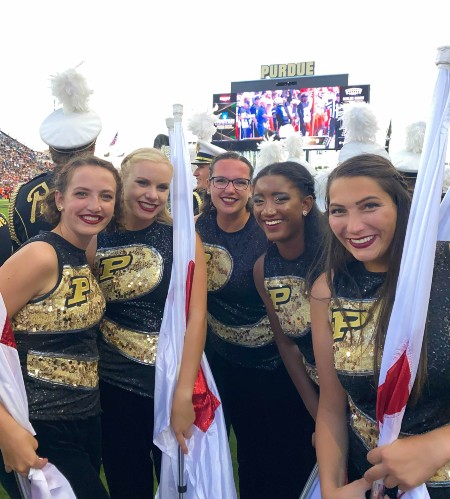 Throughout her time at Purdue University, Hannah Tomkins has been a member of the Golden Silks Color Guard.