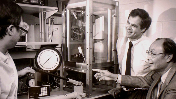 Historic photo of chemical engineering students and faculty in a Purdue lab