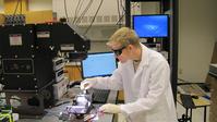 Miskin working in the lab