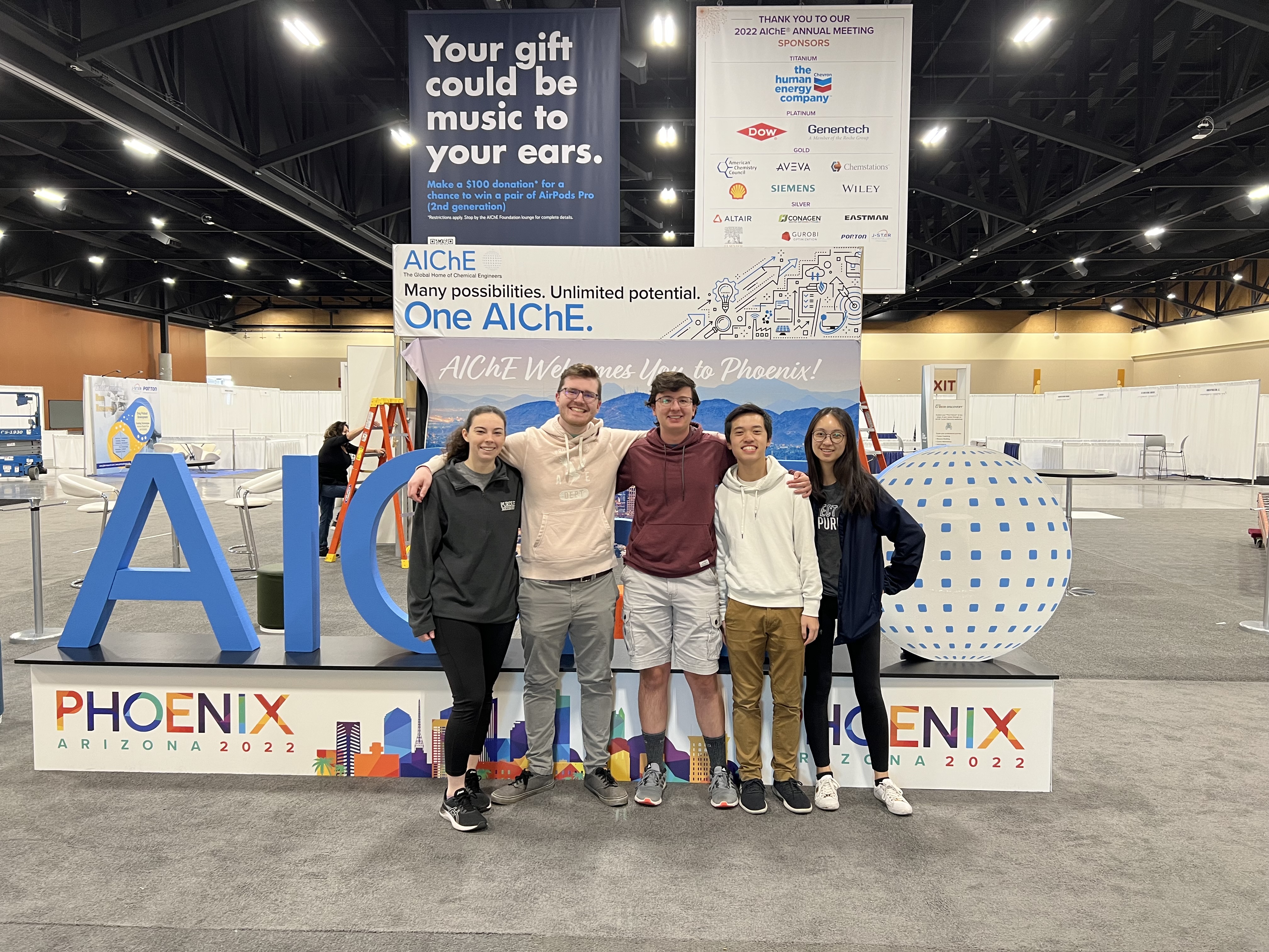 The 2022 nationals team stands in front of the ASC 2022 sign