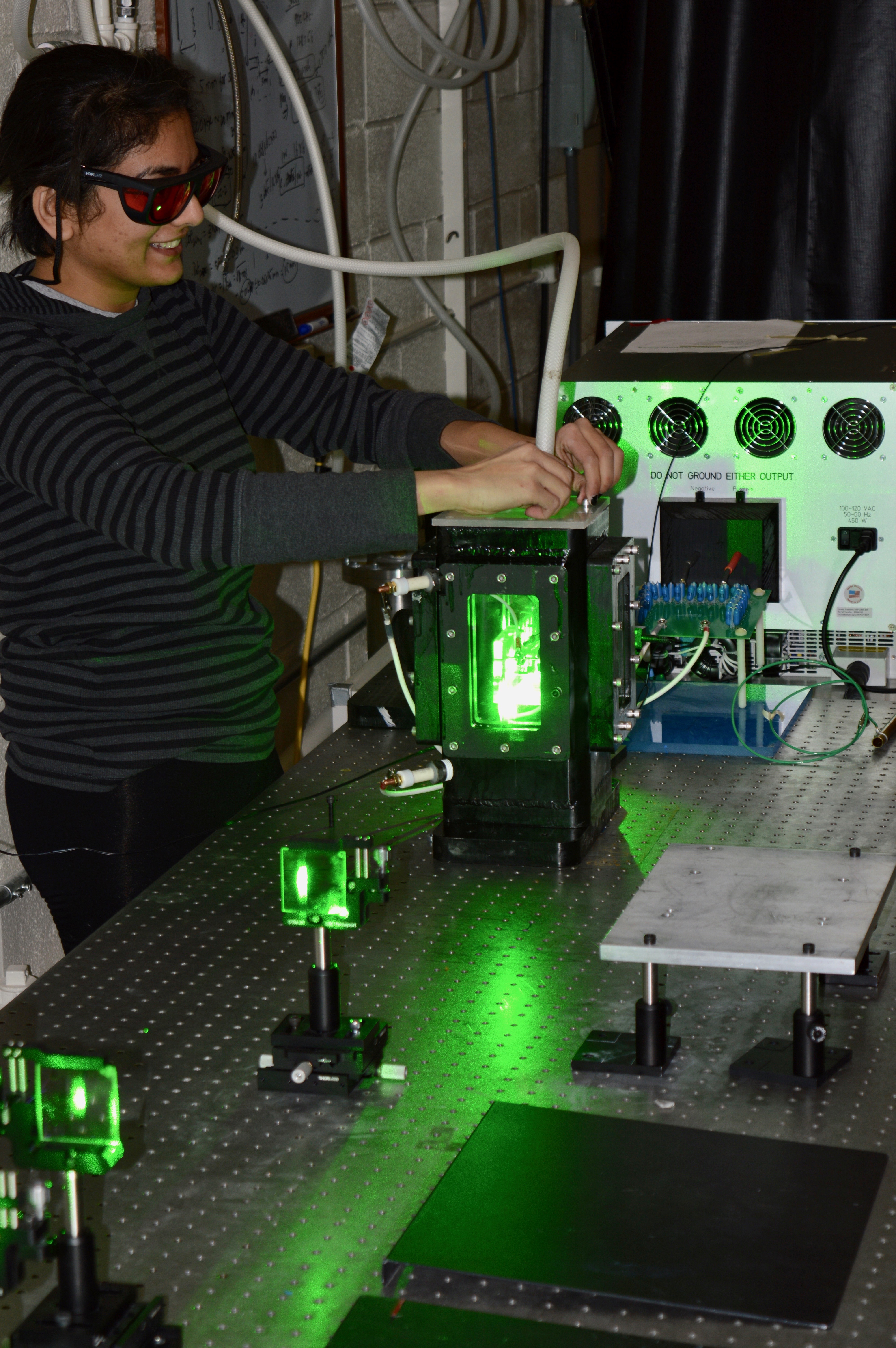 Bhavini Singh demonstrates particle image velocimetry for measuring the flow field induced by a plasma discharge.