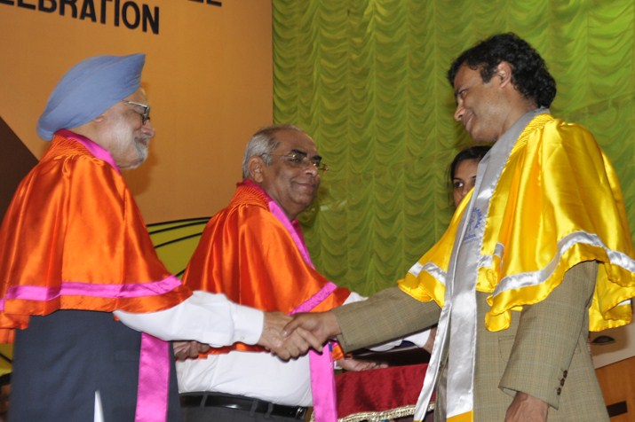 Professor Roy receiving award