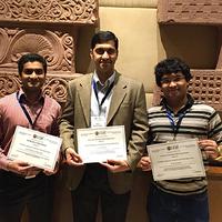 Graduate students Hrishikesh Jayakumar, Arnab Raha, and Professor Vijay Raghunathan
