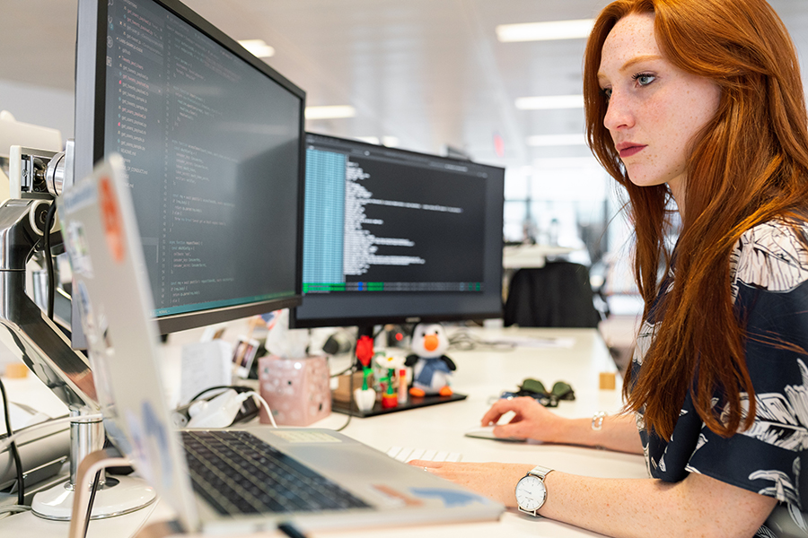 image of woman coding on computer
