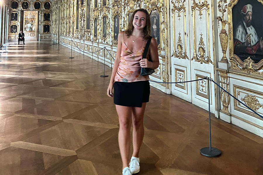 Kaylee Smith poses for a photo in the Palacio Real de Madrid, a large 18th-century palace in downtown Madrid that is the official residence of the Spanish royal family.
