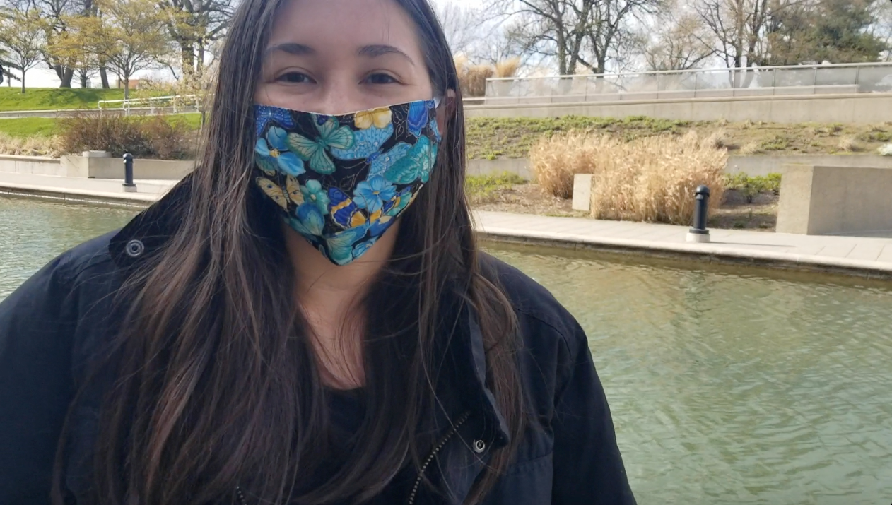 Emily D'Antonio wearing mask by Indianapolis canal