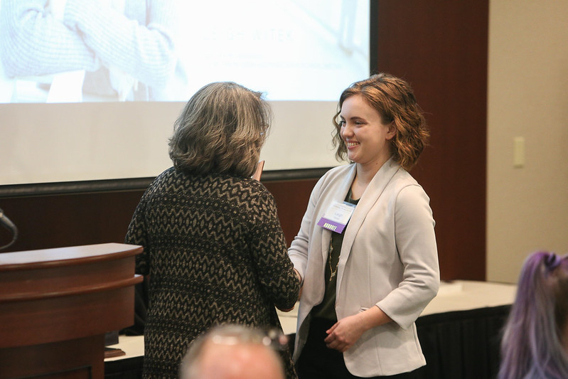 Leigh receives academic award from Dr. Mary Pilotte