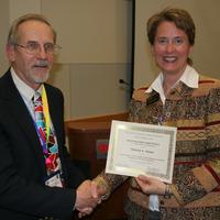 Michele Strutz receiving award