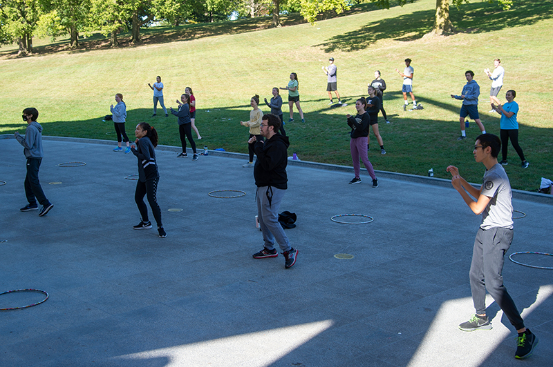 First-Year Engineering Students exercising to Zumba on Slayter Hill