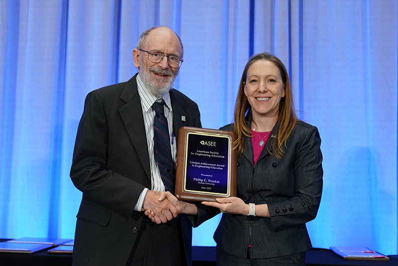 Dr. Wankat receives plaque from ASEE representative