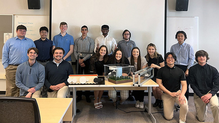 Purdue's EPICS team with a prototype at the Childrens Museum of Indianapolis 