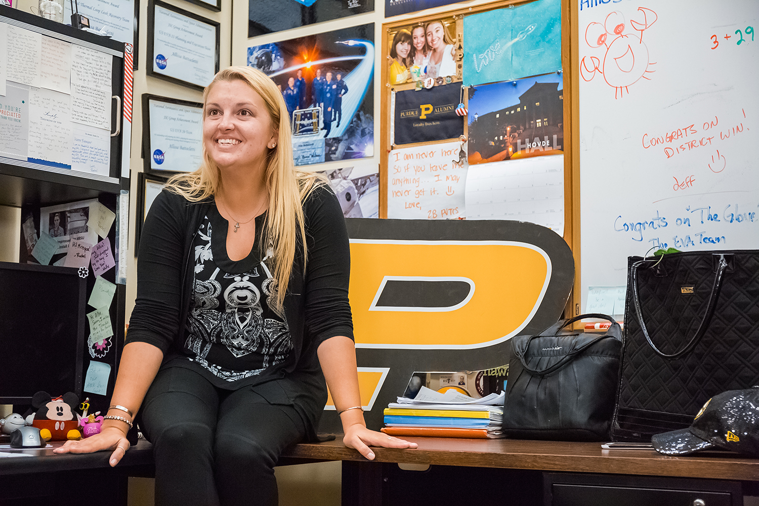 Allisa Battocletti at her desk in NASA
