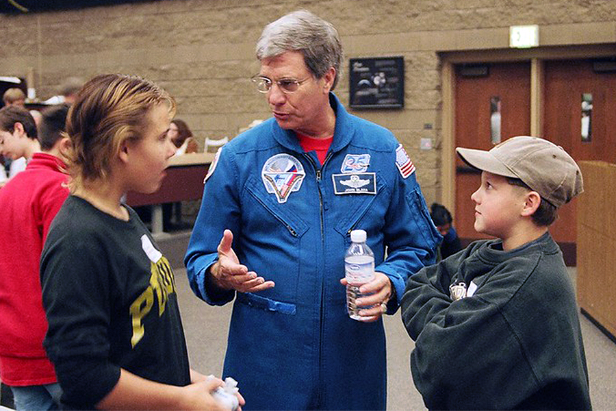 John Blaha with kids