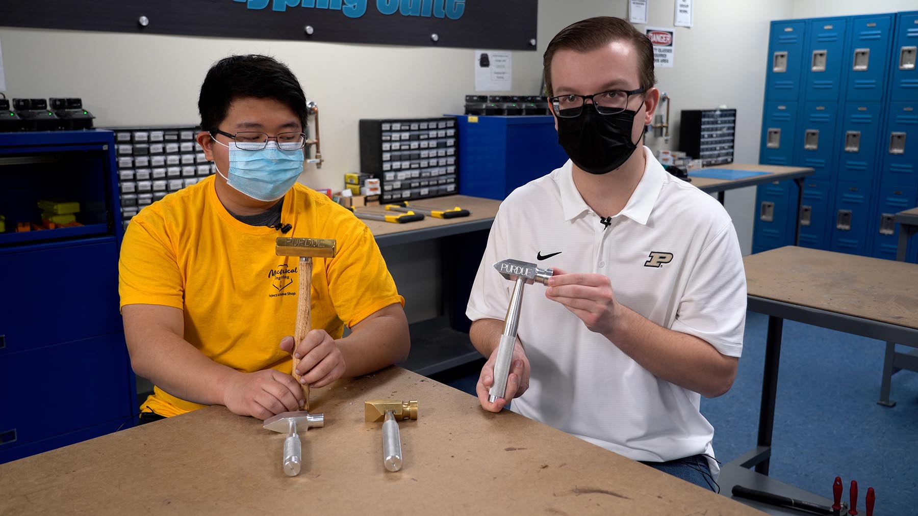 Kyle Wang (left), John Parker (right), and Xing Fan (not pictured) worked through numerous prototypes to design a new hammer for the 21st century.