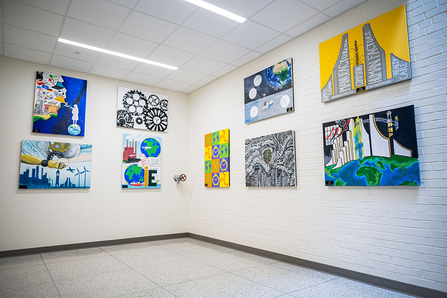 Stairwell in Grissom Hall with paintings