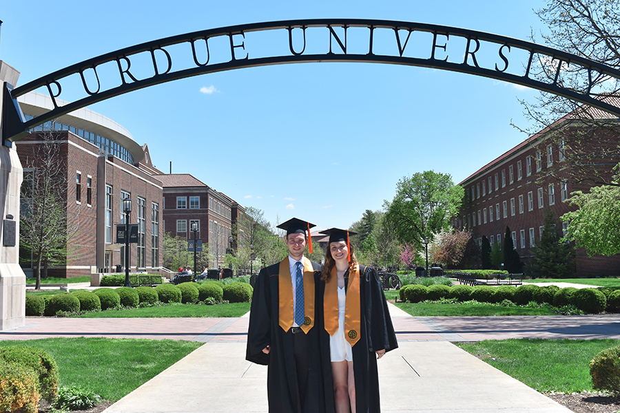 Photo of Reese and Riley Holloway in front of engineering arch