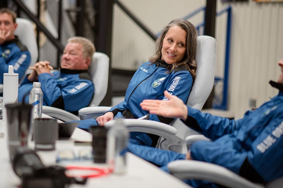 Powers sitting at table during training